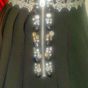 Beaded and pleaded skirt